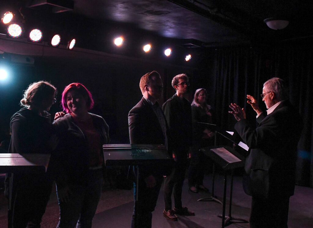 The cast of Caesura in rehearsal for the production's staged reading in 2024.